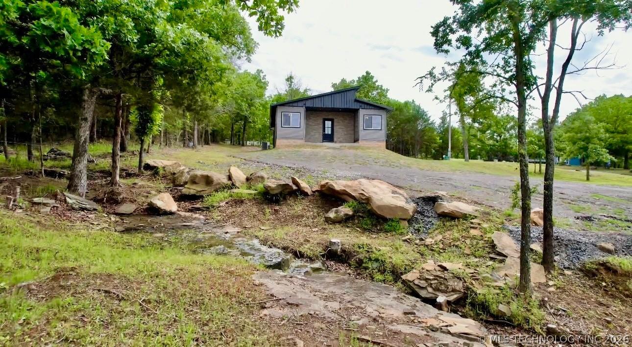 Image 1: Natural creek running through the property