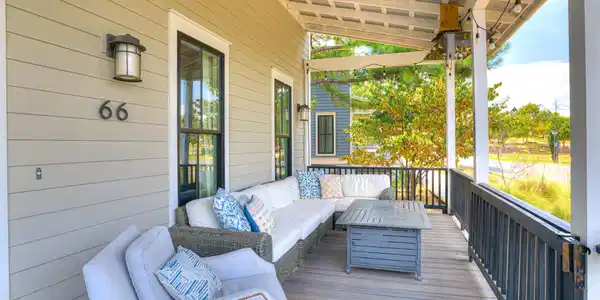 Image 4: Covered front porch featuring horizontal siding, d