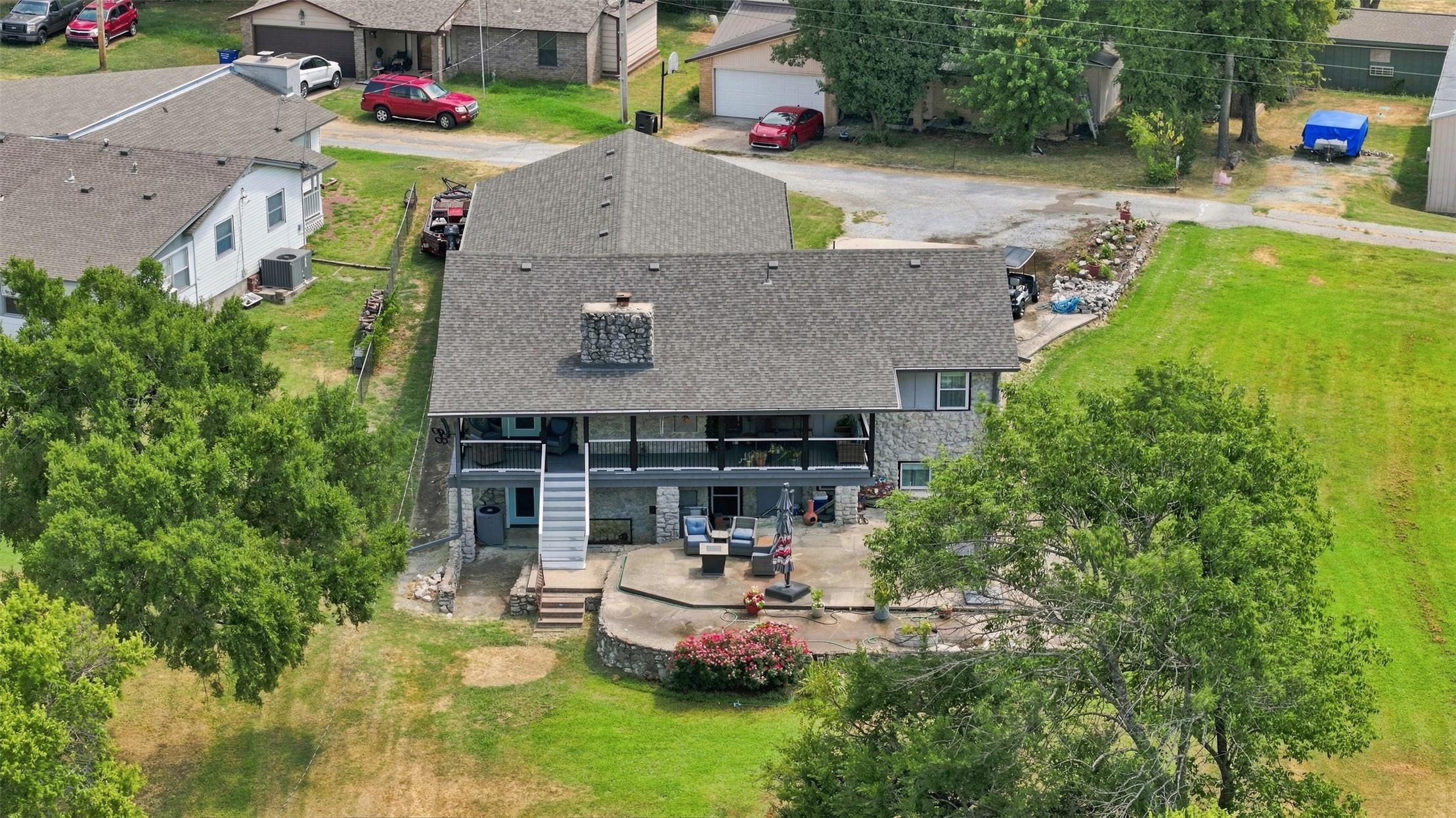Image 2: Expansive backyard retreat featuring a multi-level