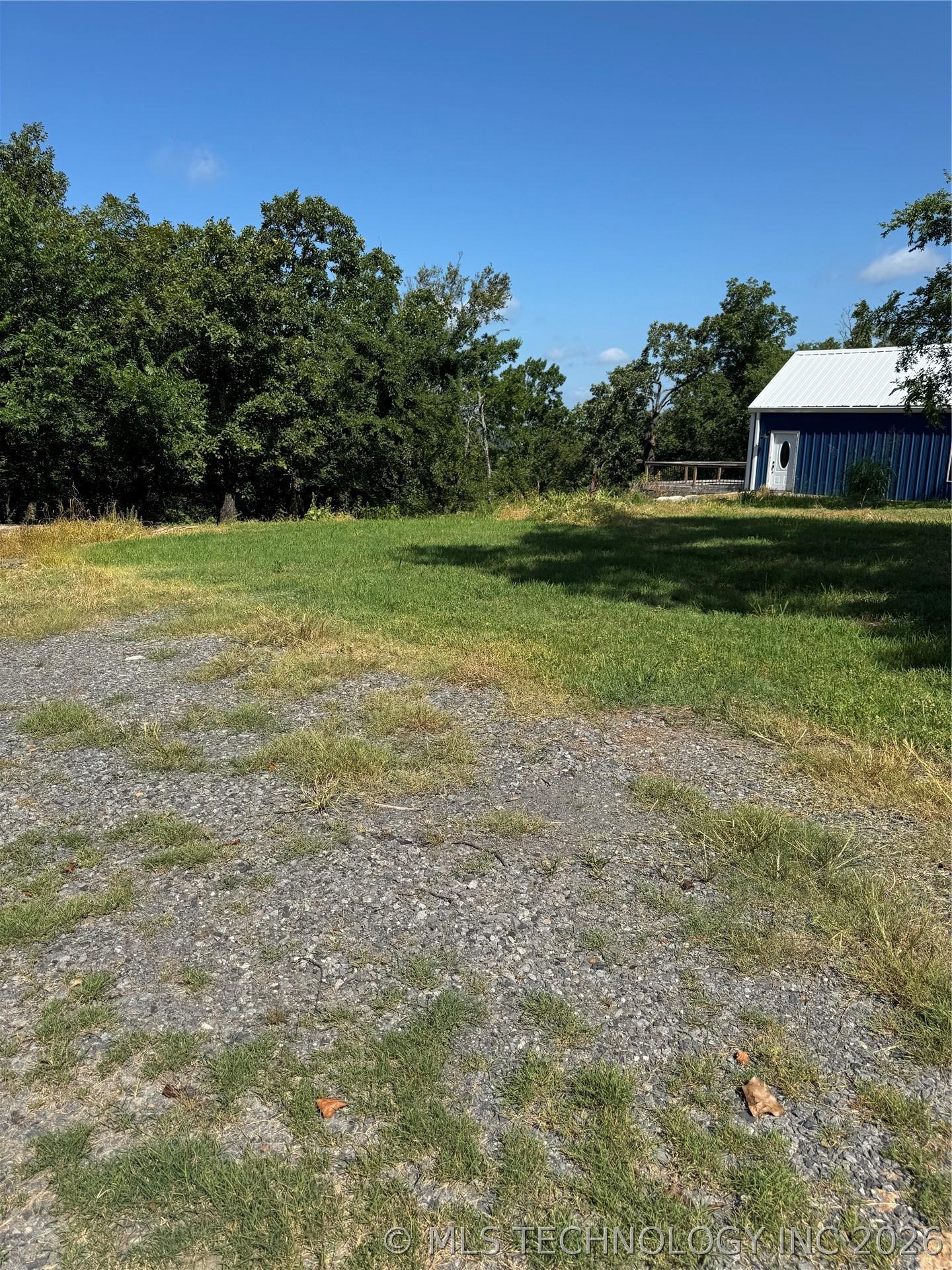 Image 4: Structure is on Lot 9.  Not included in sale.