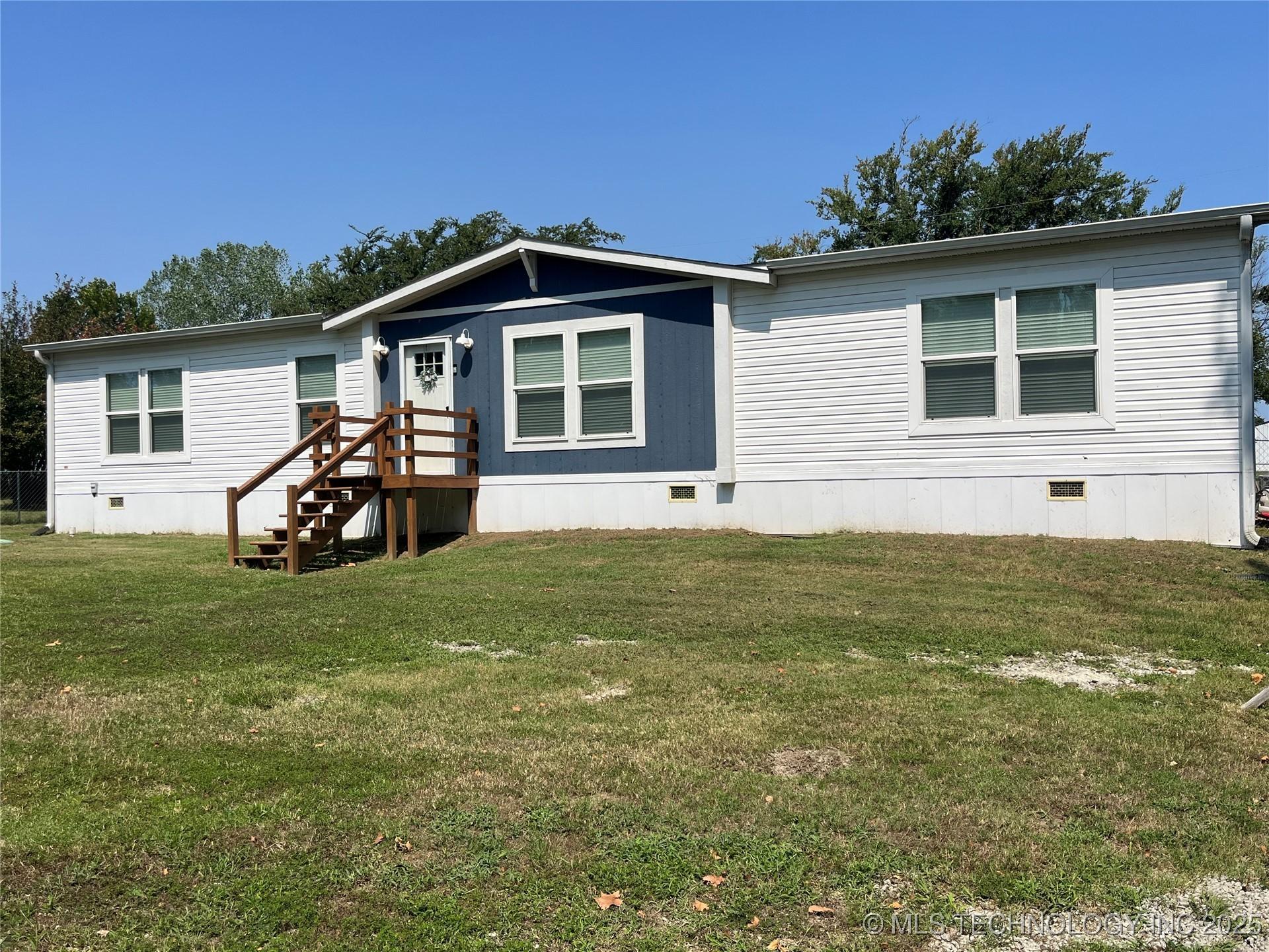 Image 1: Front view of home