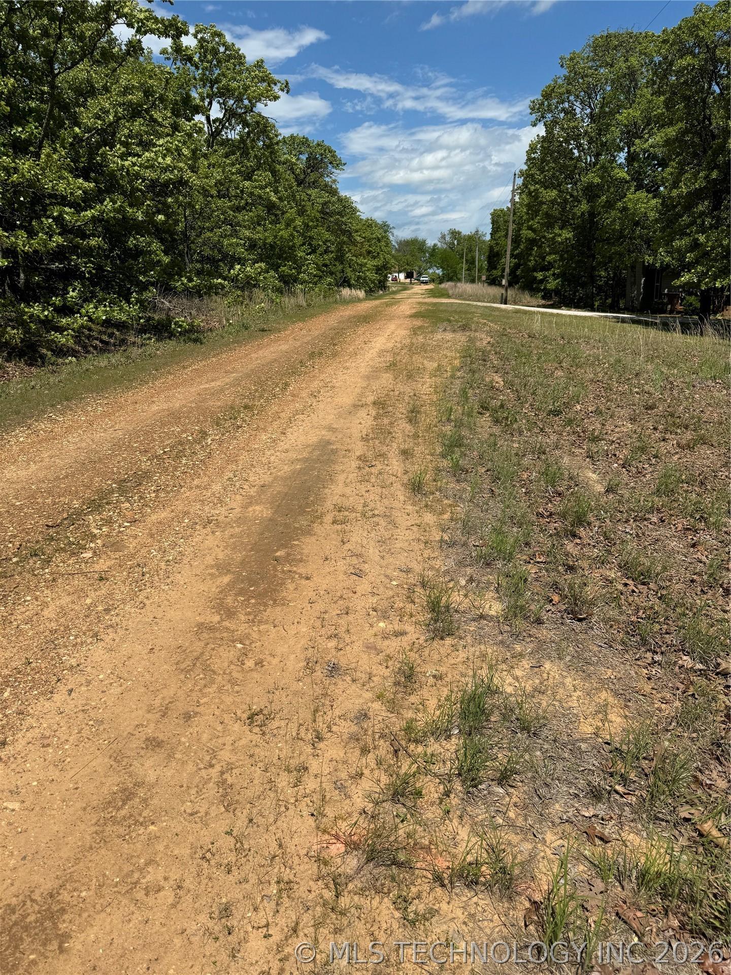 Image 2: S 4532 Road looking North.  Note neighbor's drivew