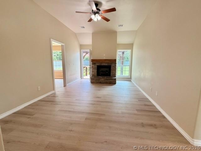 Image 3: Spacious living room featuring vaulted ceilings, l