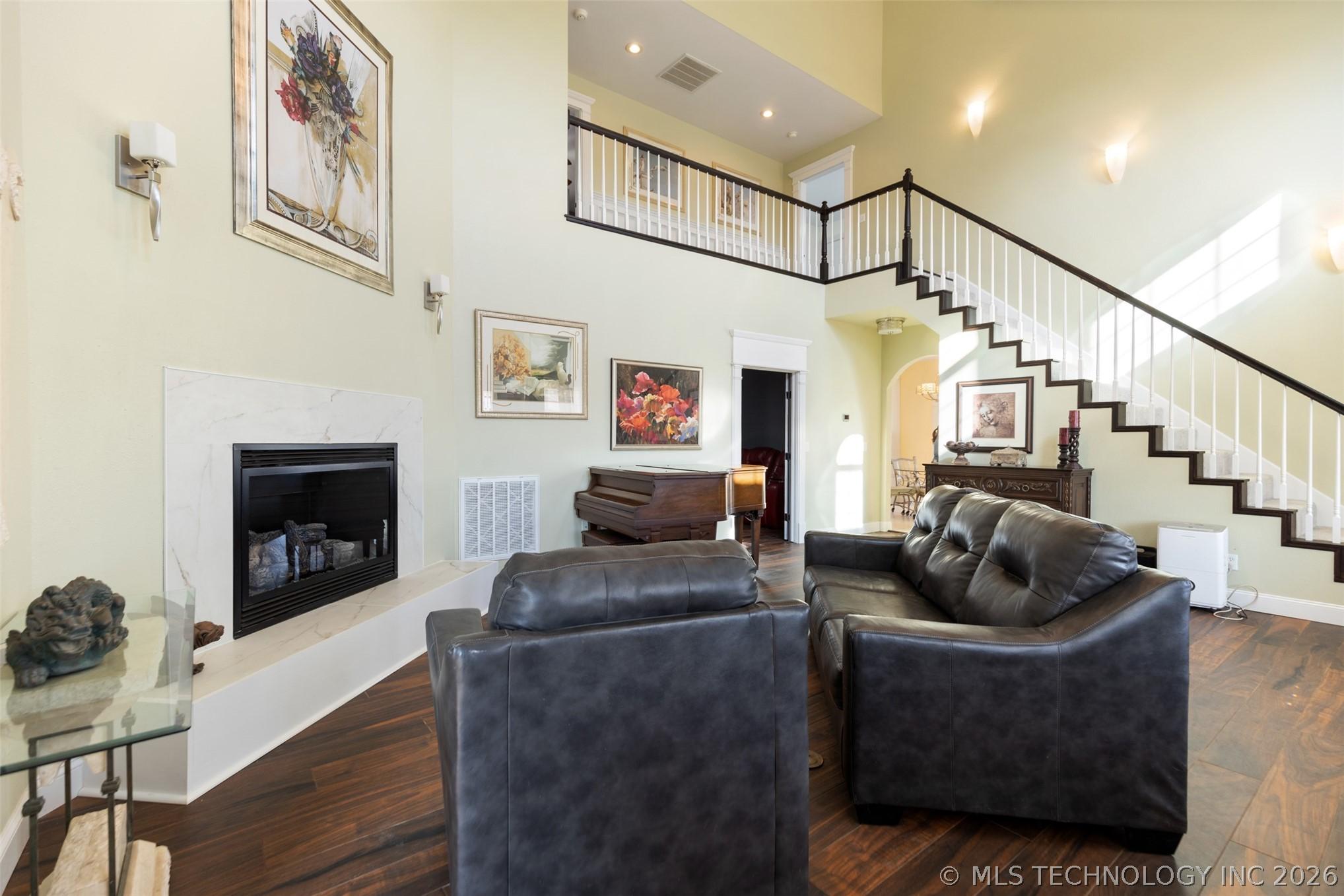 Image 2: Main living area with beautiful fireplace and soar