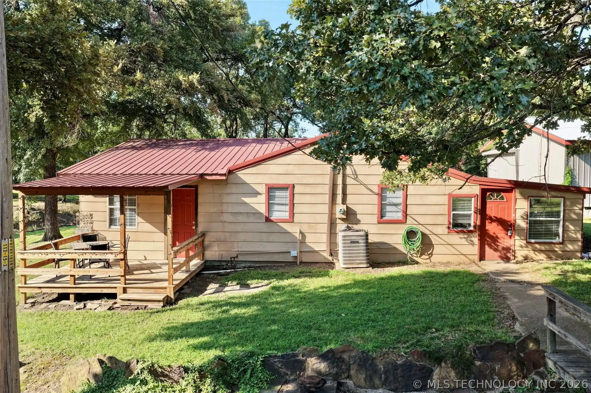 Image 1: Front view of home