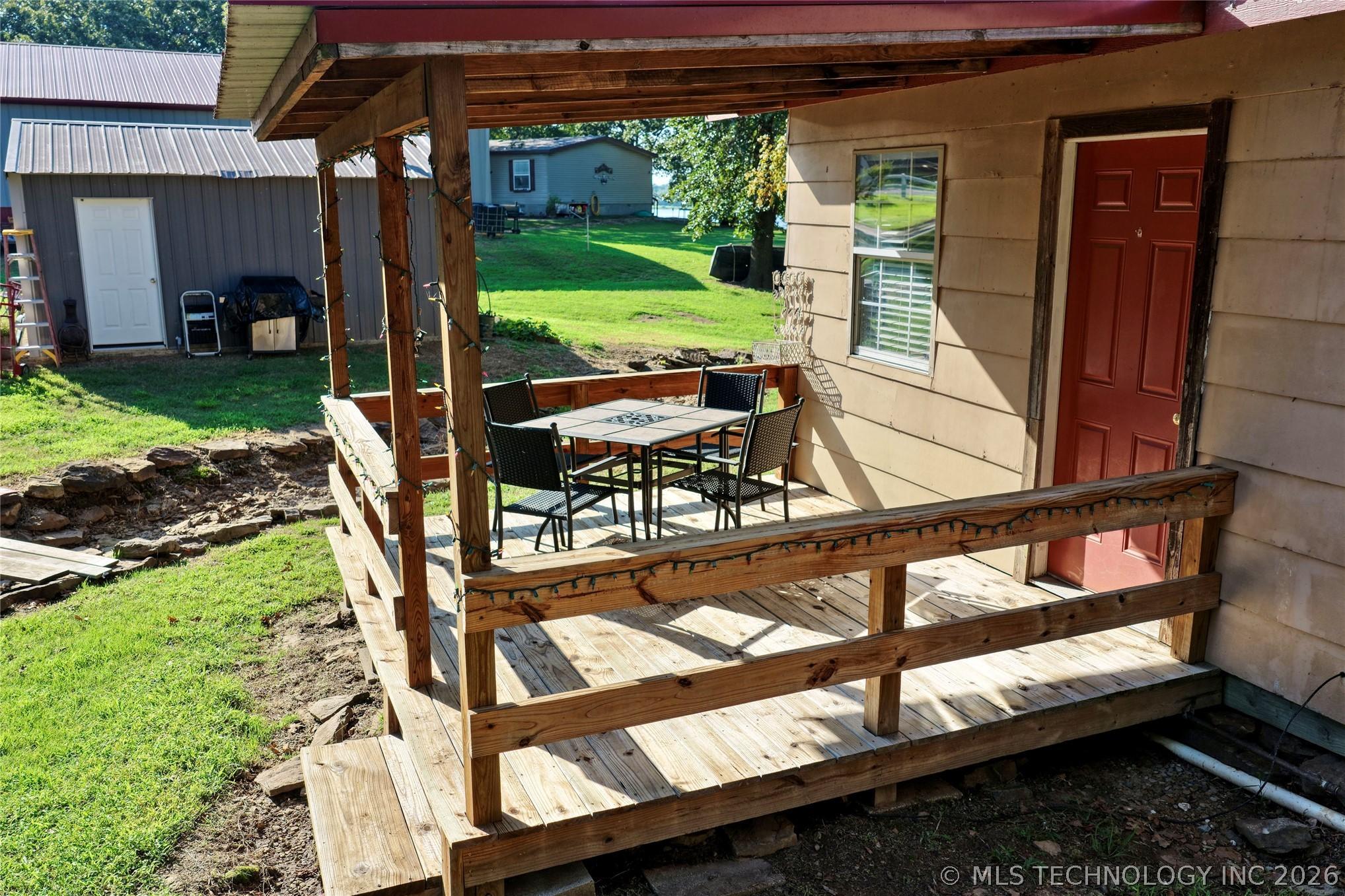 Image 2: Covered front porch on home