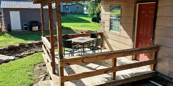 Image 2: Covered front porch on home