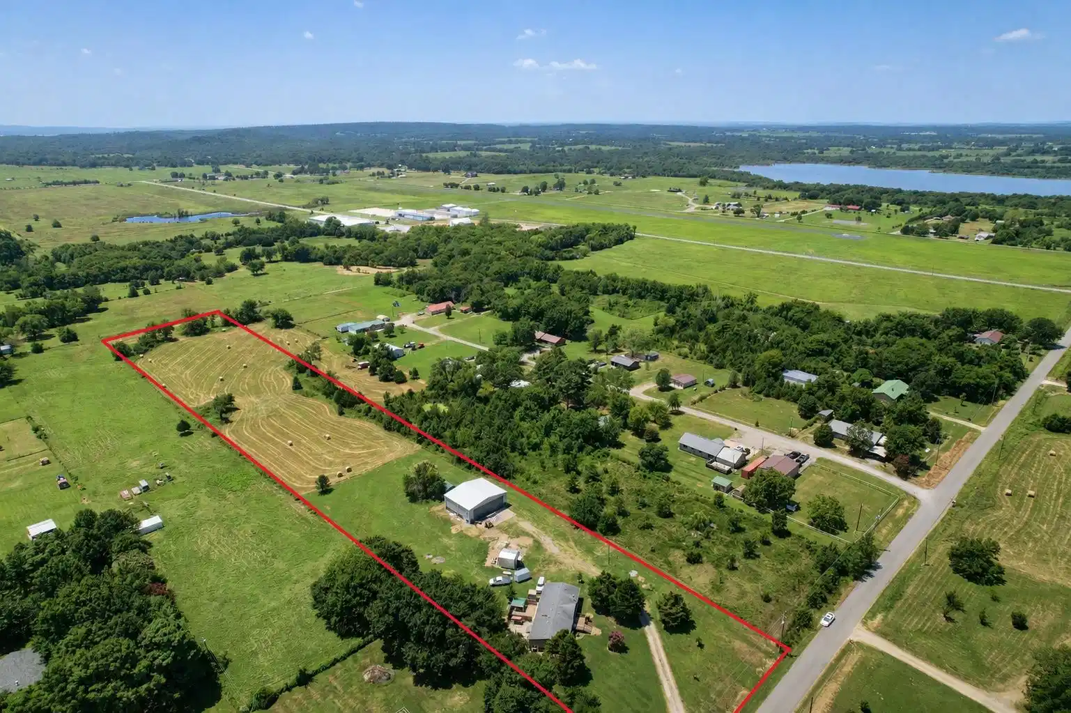 Image 1: Expansive rural property featuring a large open fi
