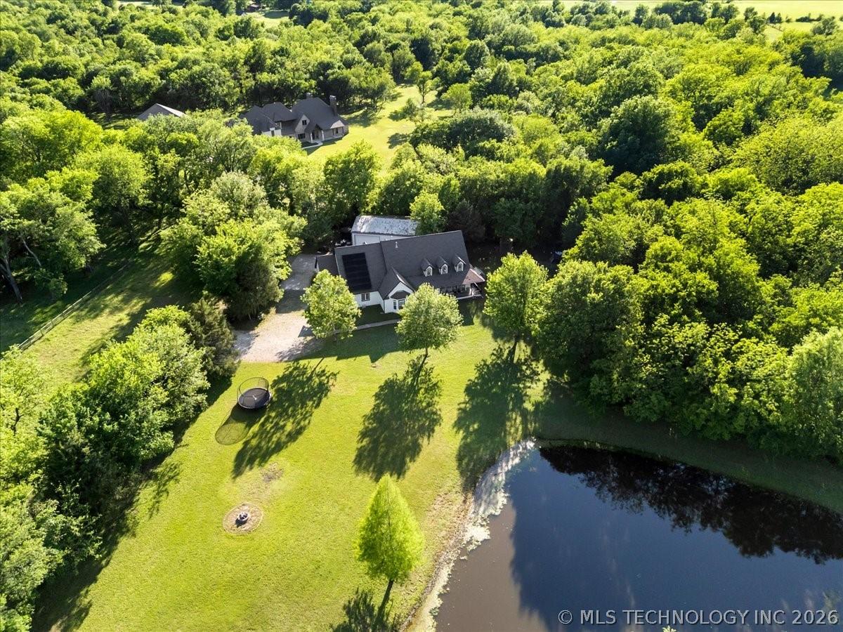 Image 2: Aerial perspective showcasing a spacious property
