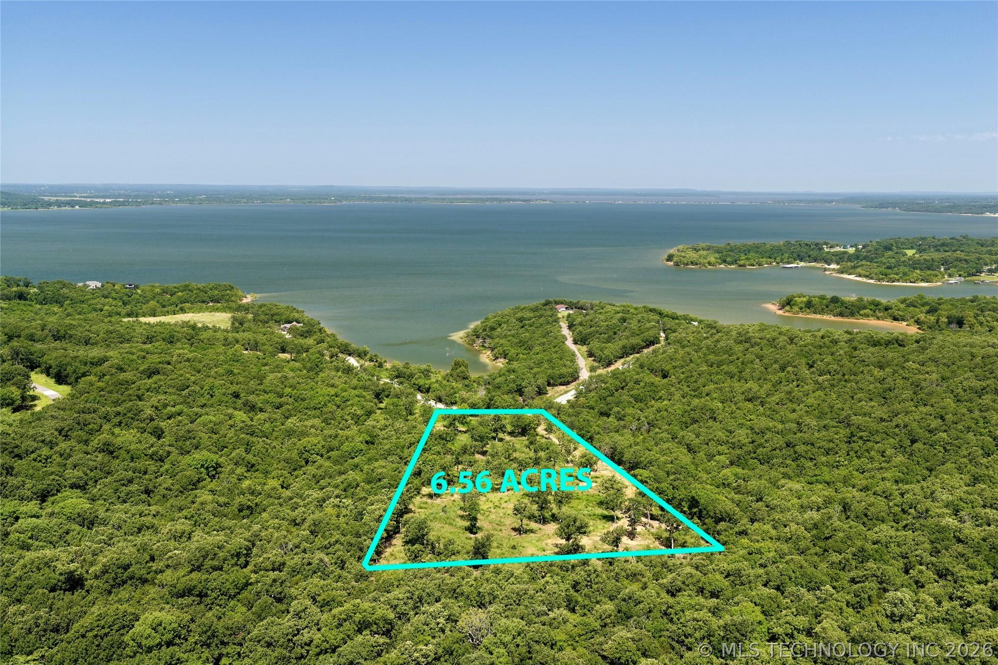 Image 1: Cleared 6.56 Acres with a road built to go to the