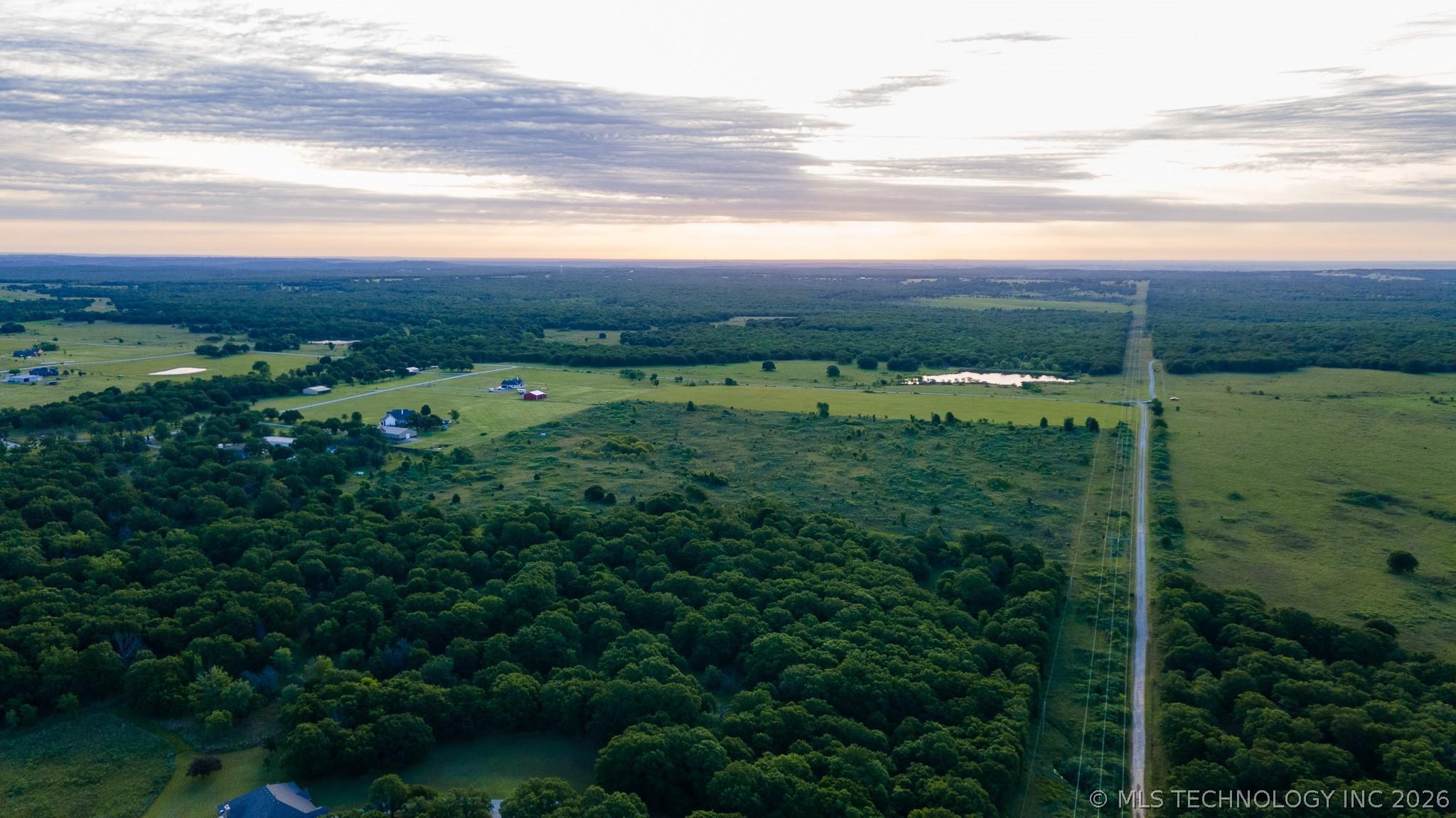 Image 2: Expansive aerial landscape featuring extensive tre Image 2: Expansive aerial landscape featuring extensive tre