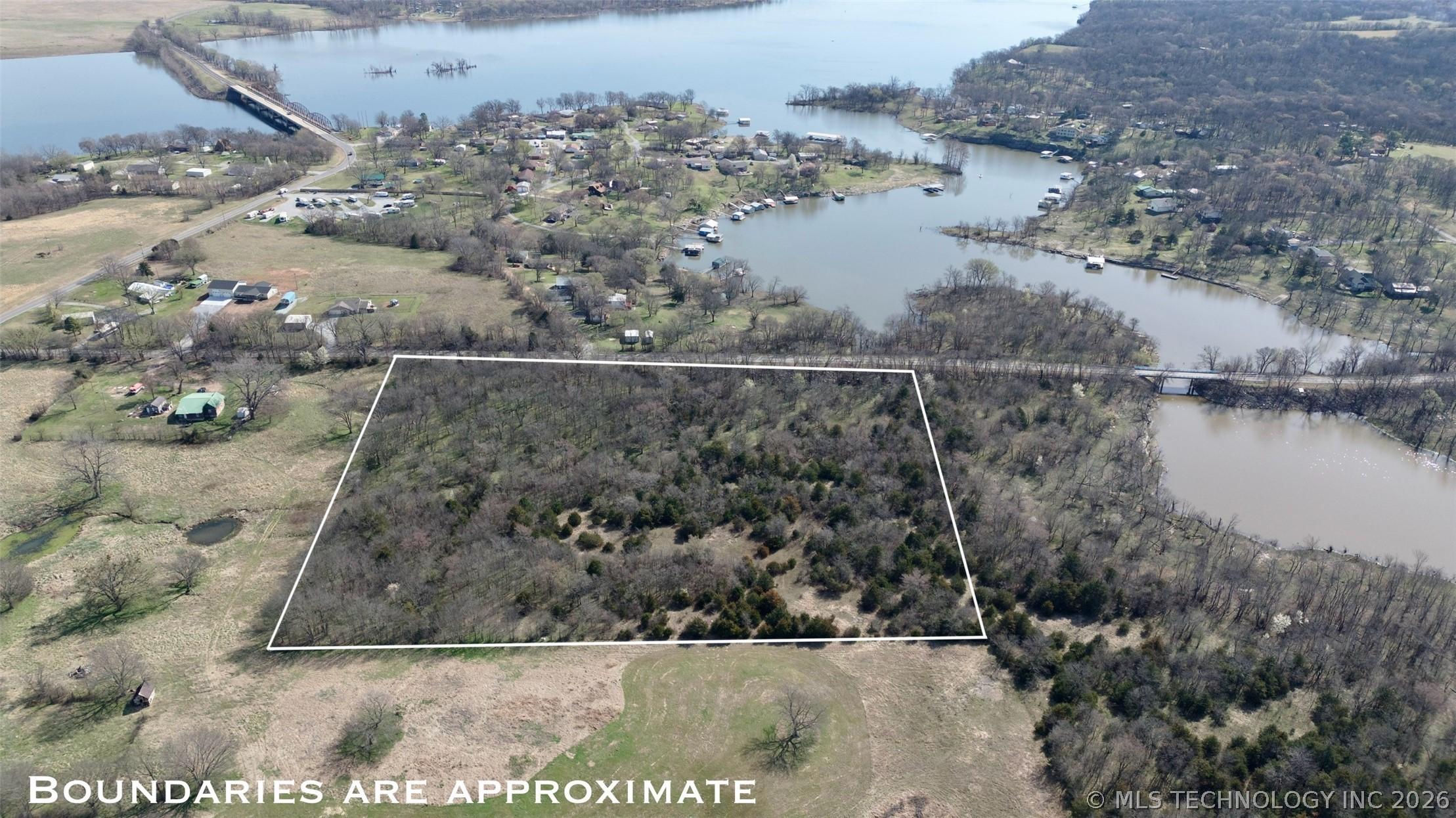 Image 1: Looking east toward Lake Hudson. Strang Bridge is