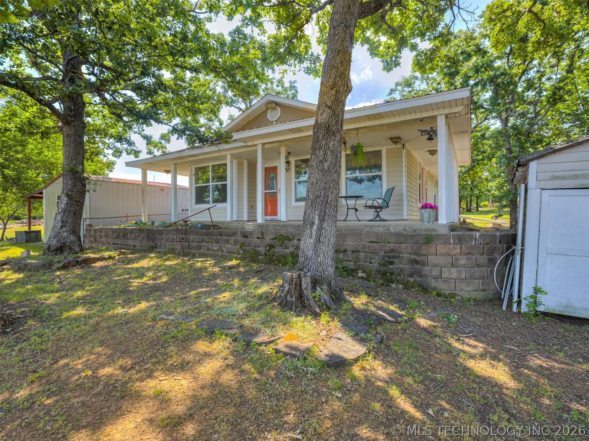 Image 3: Ranch-style residence featuring a covered front po