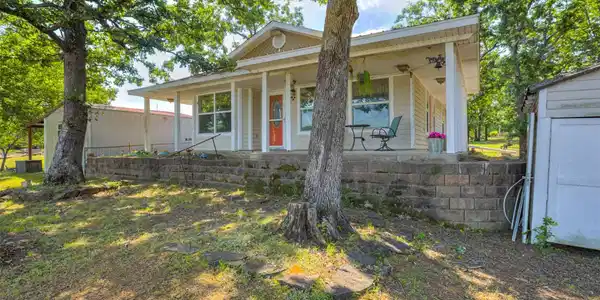 Image 3: Ranch-style residence featuring a covered front po