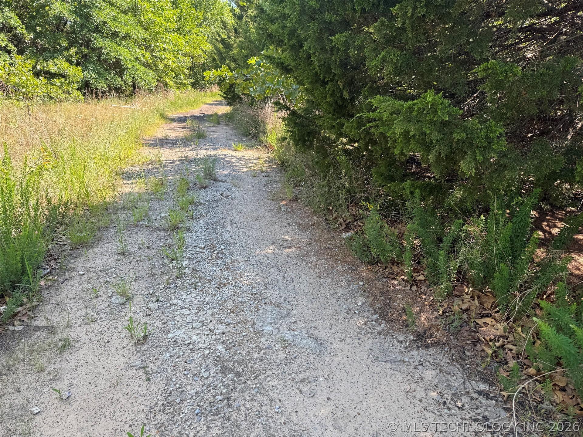 Image 2: Gravel Road  Lot on Right