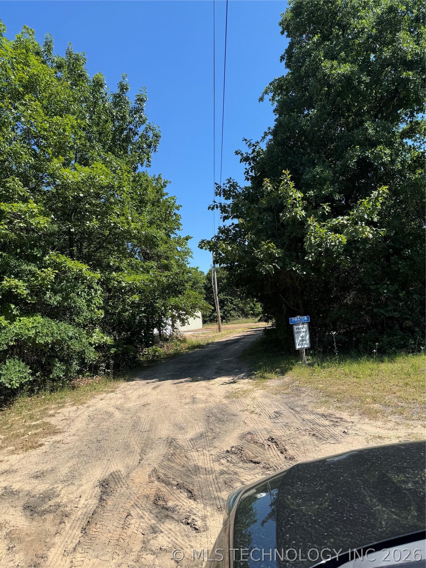 Image 4: Entrance to road leading to lot
