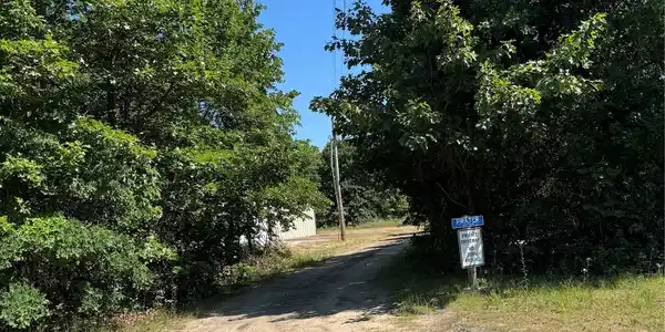 Image 4: Entrance to road leading to lot