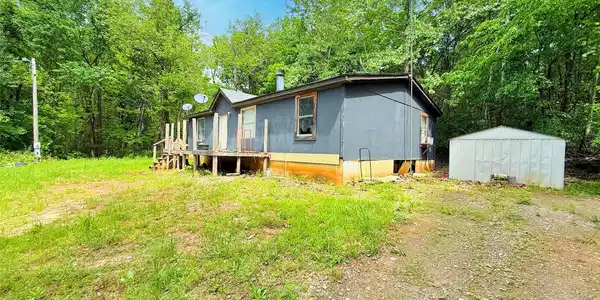 Image 2: Side View of Home