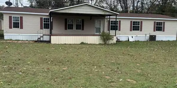 Image 2: FRONT VIEW OF HOME