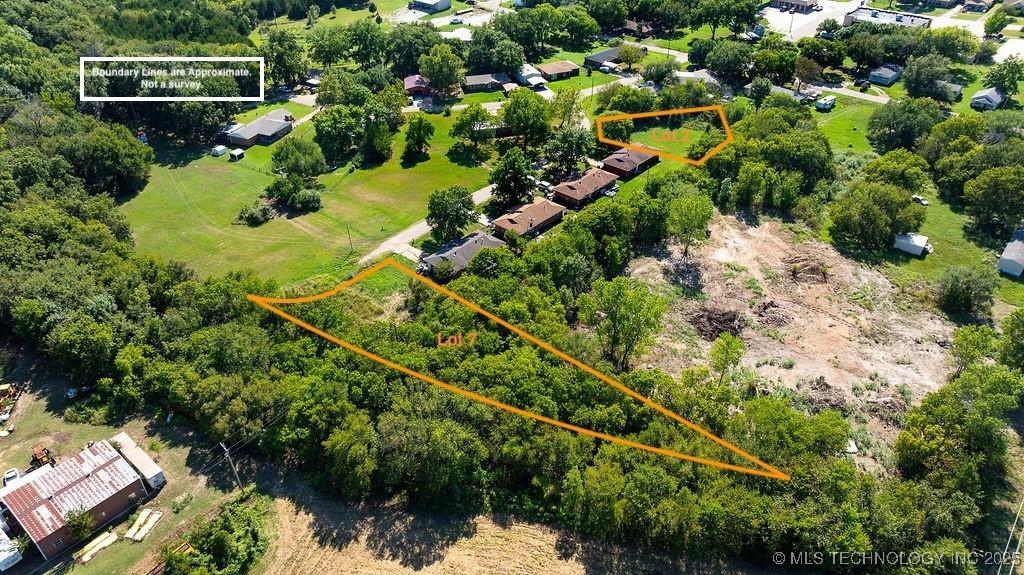 Image 1: Lots 2 & 7 in Colonial Estates. Lot lines are appr
