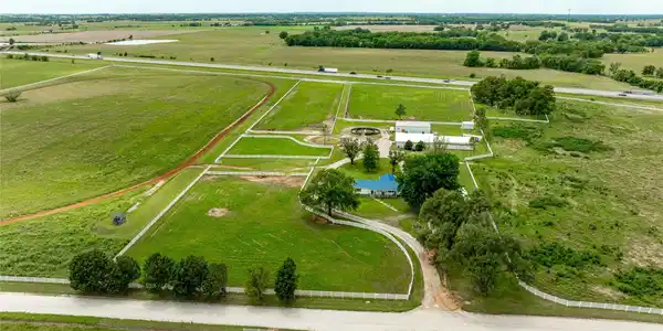 Image 2: Arial view of the majority of the property looking