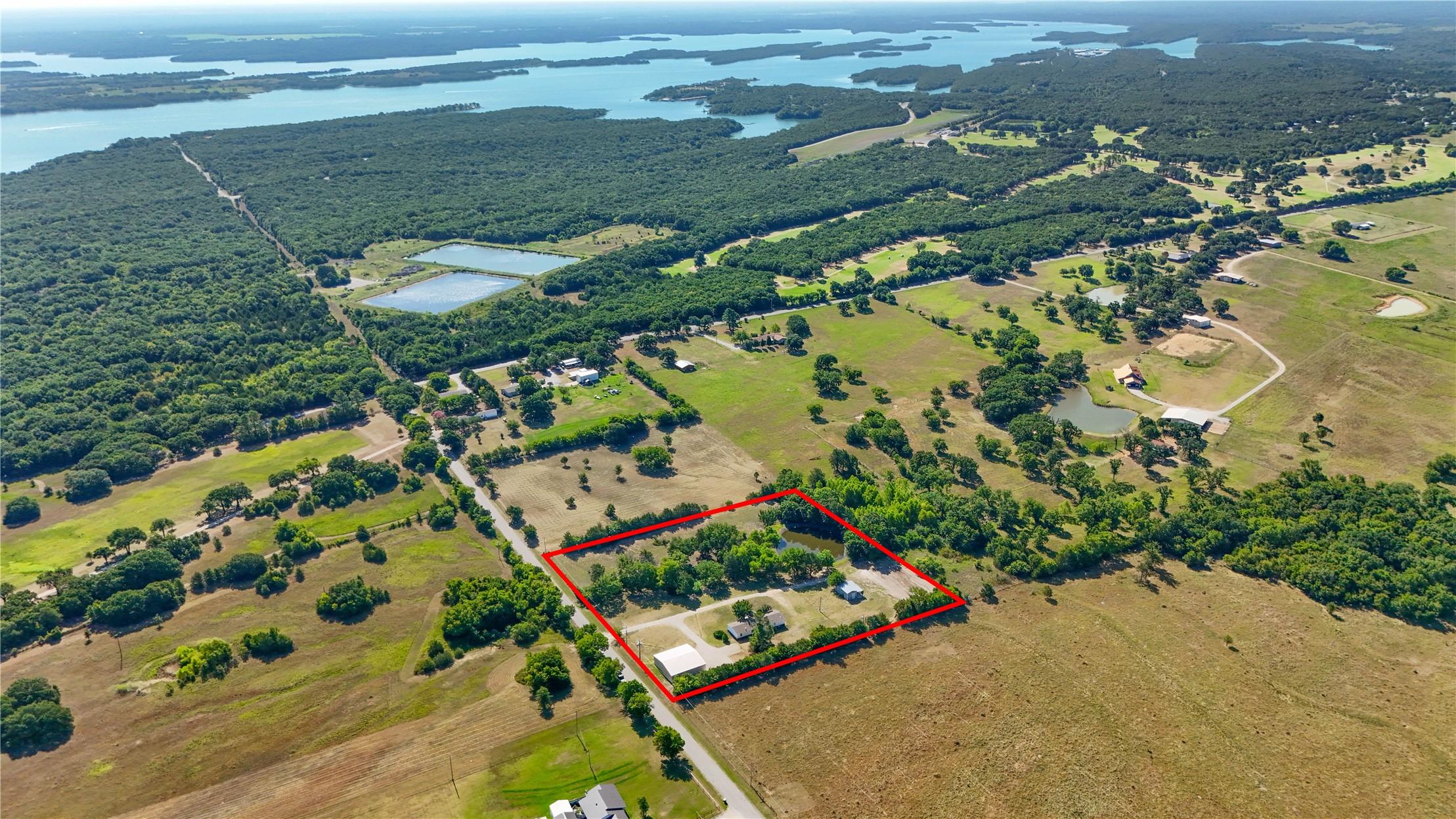 Image 2: Expansive rural property featuring a perimeter out