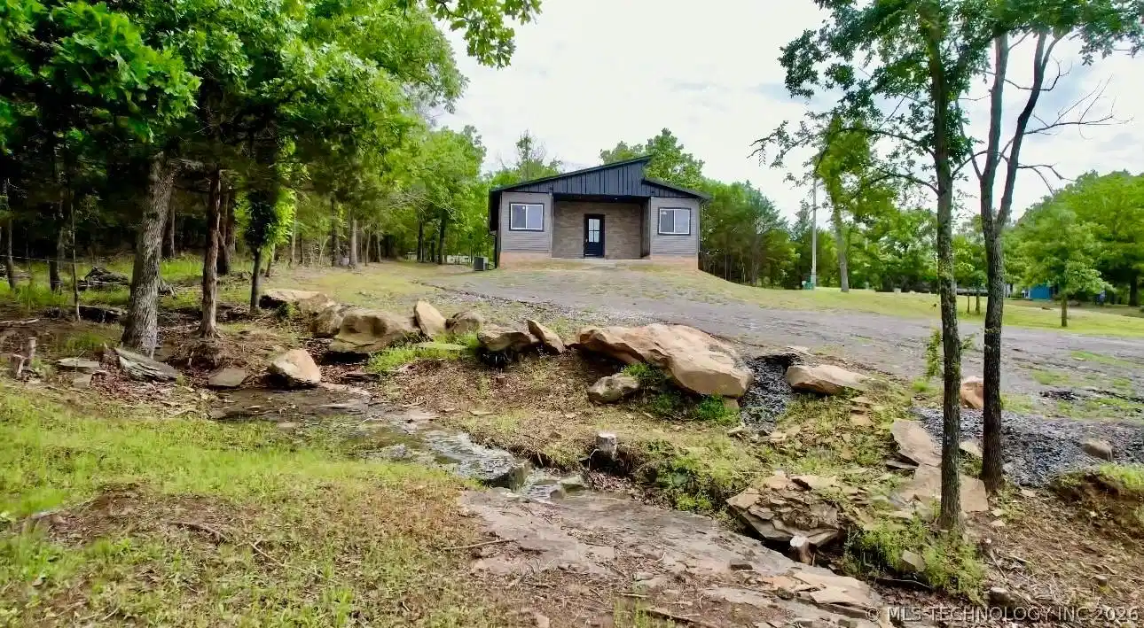 Image 1: Natural creek running through the property