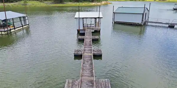 Image 2: Boat dock right behind house in protected cove