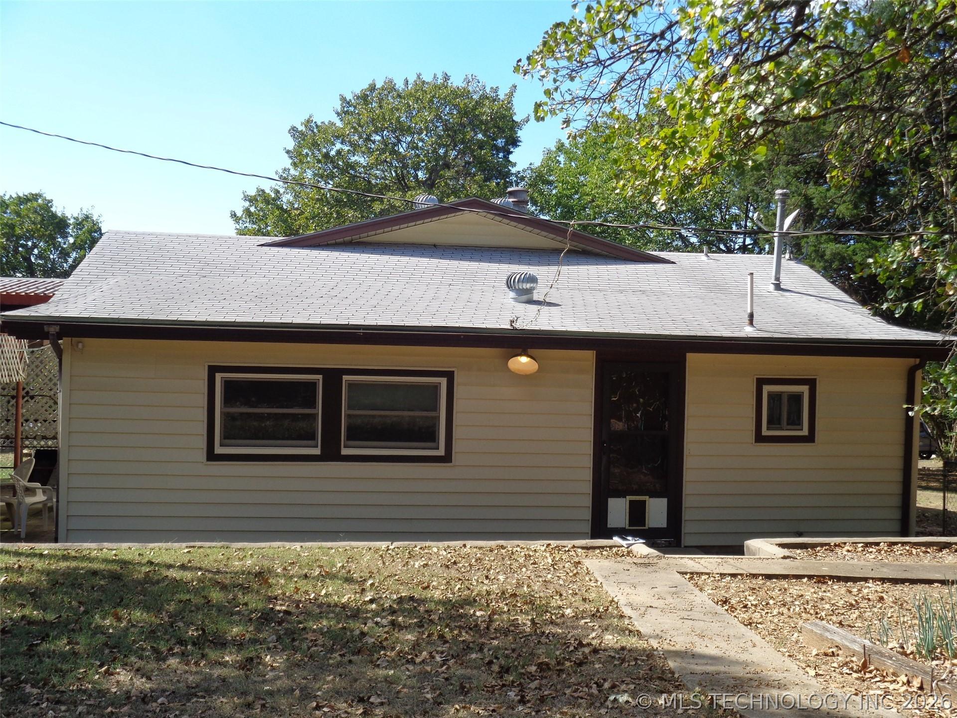 Image 2: Back View of Property