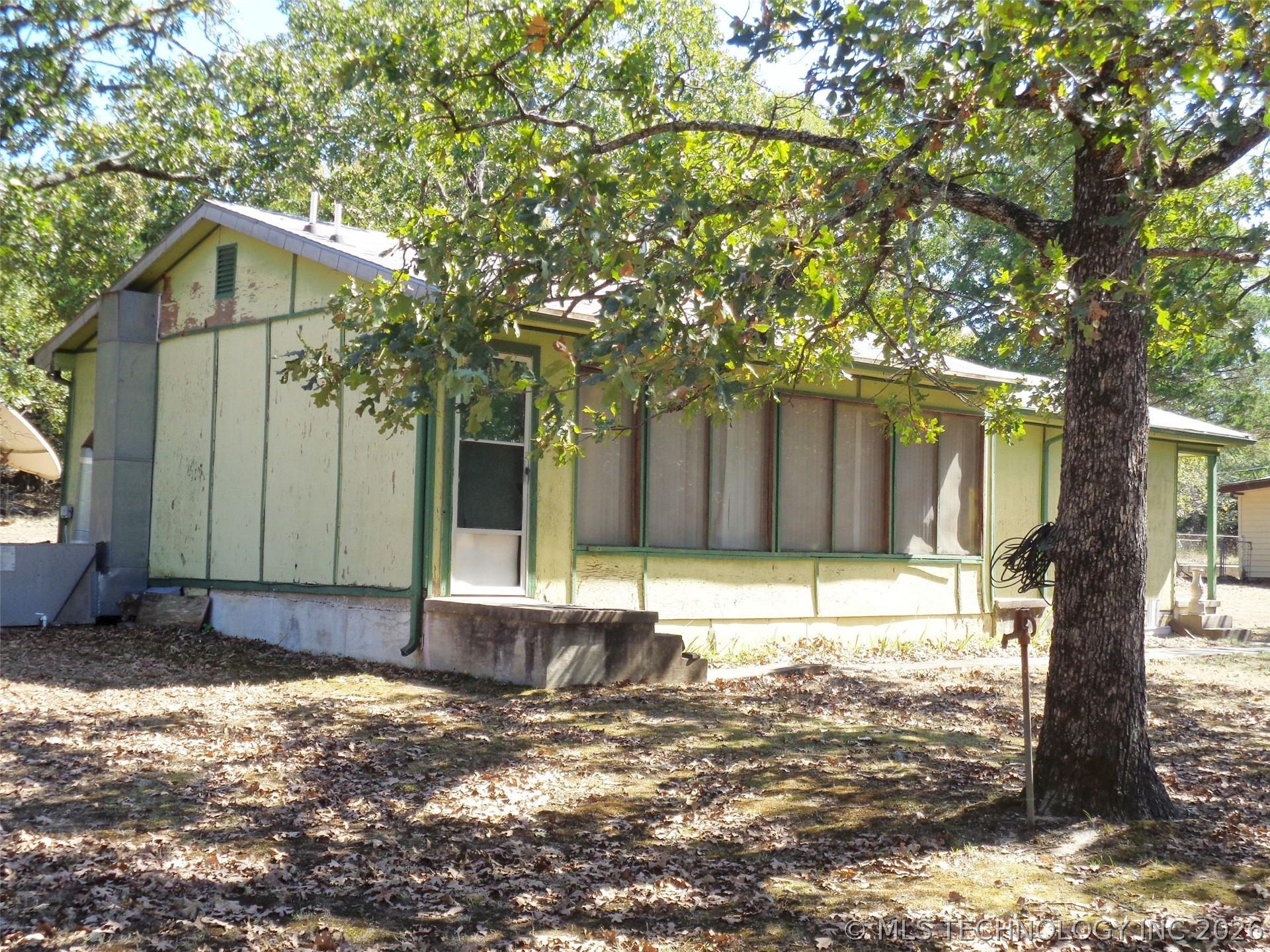 Image 3: Home has Central Heat & Air (Package Unit Shown in
