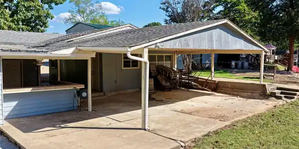 Image 3: Outdoor Kitchen on Left of Photo and Large Covered