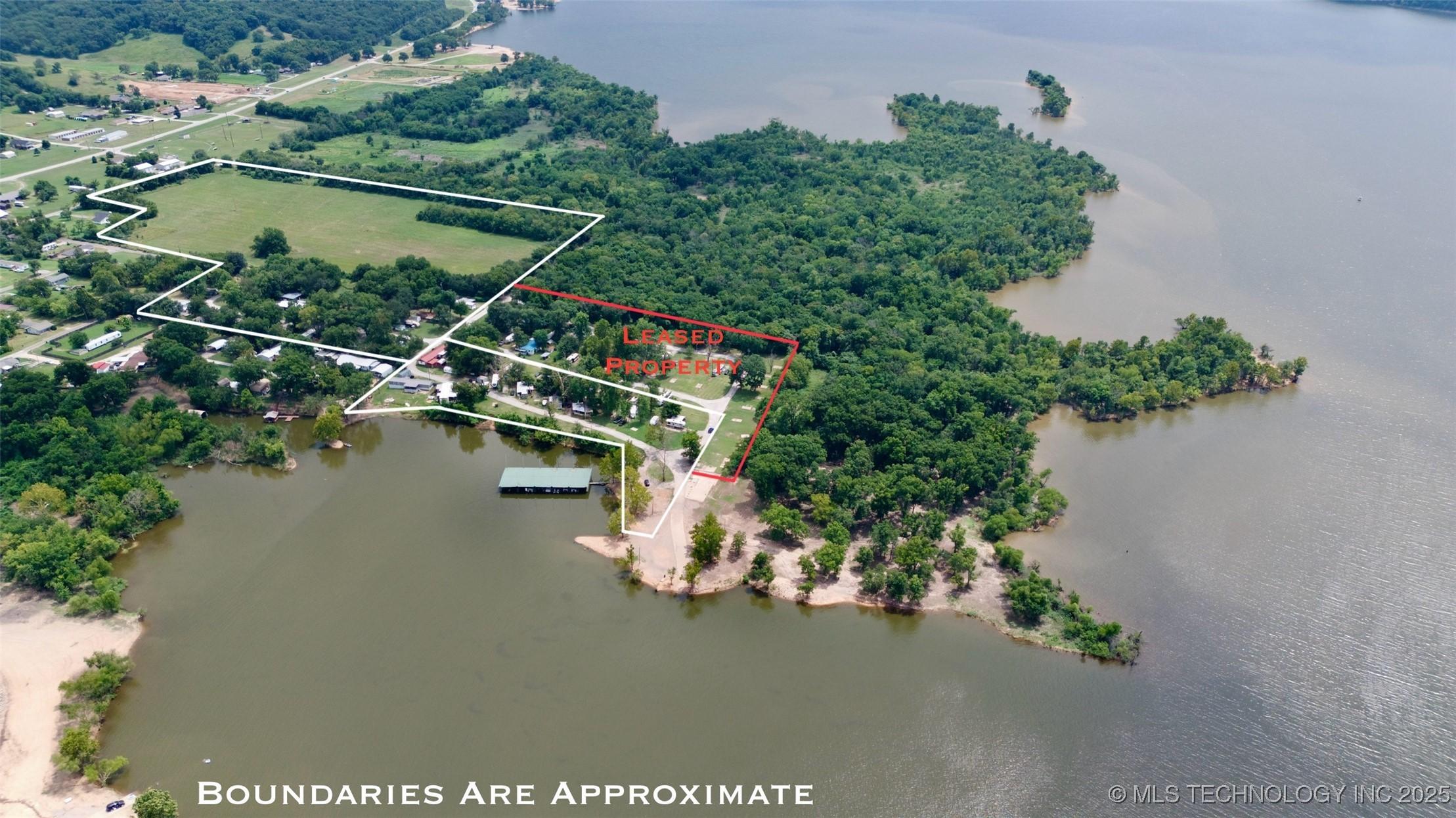Image 2: Aerial Overview &ndash; Broad view showcasing property l