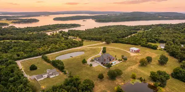 Image 2: Expansive property featuring a main residence, sec