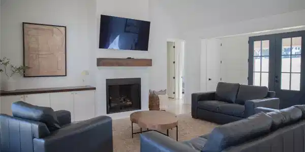 Image 3: Vaulted ceiling, built-in cabinetry with wood-fini