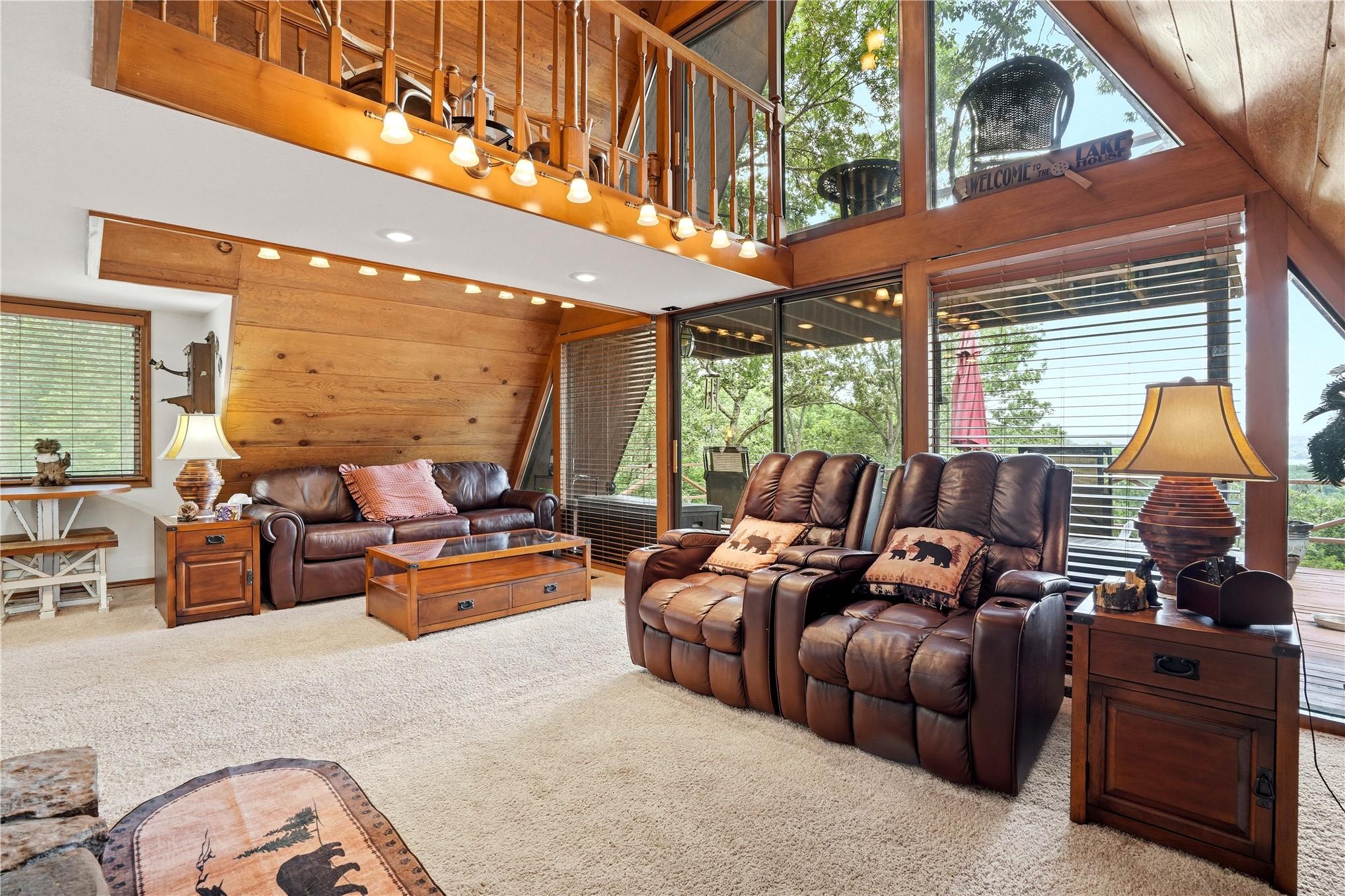 Image 2: Vaulted wood-paneled ceiling with exposed beams