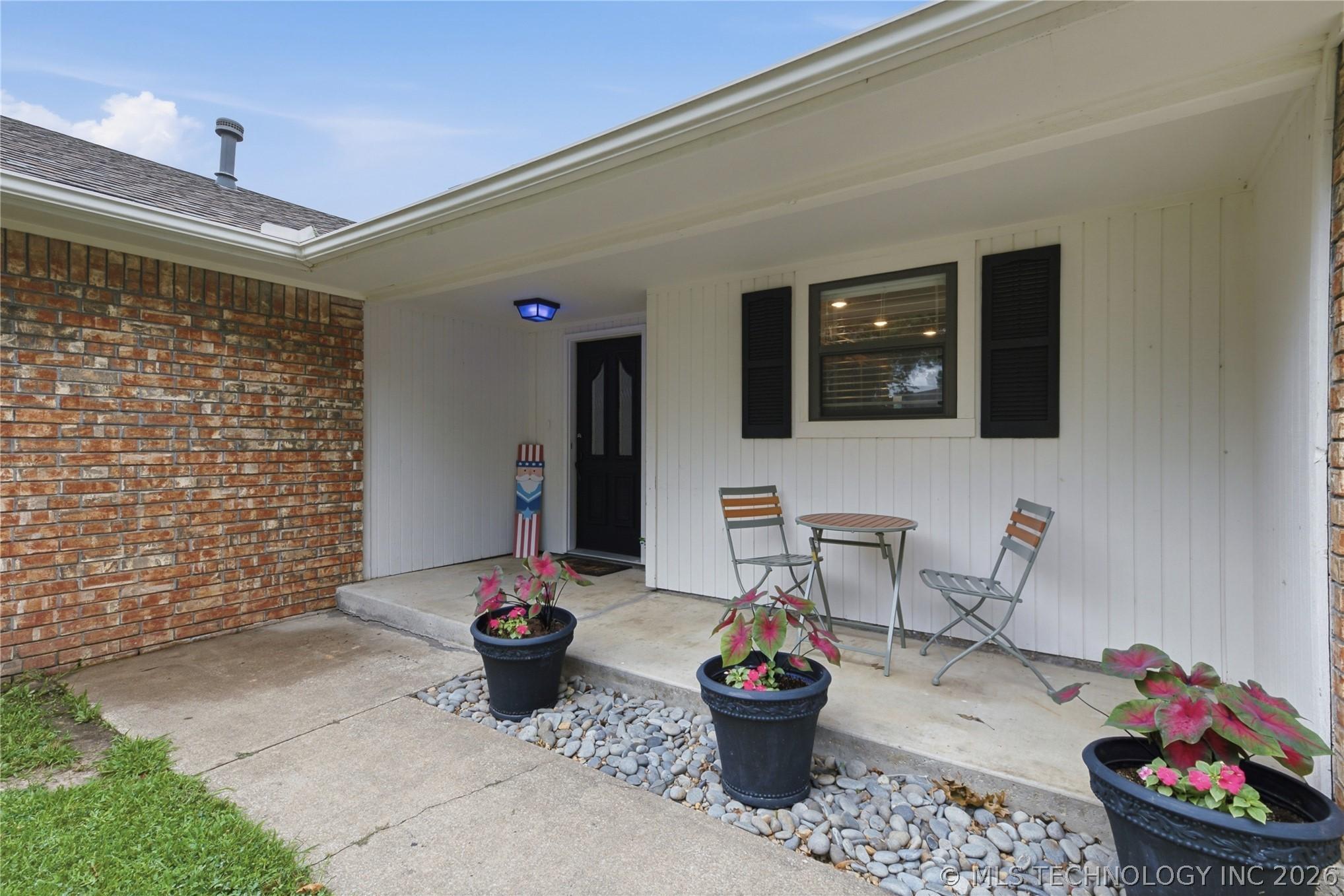 Image 2: Charming Covered Entry