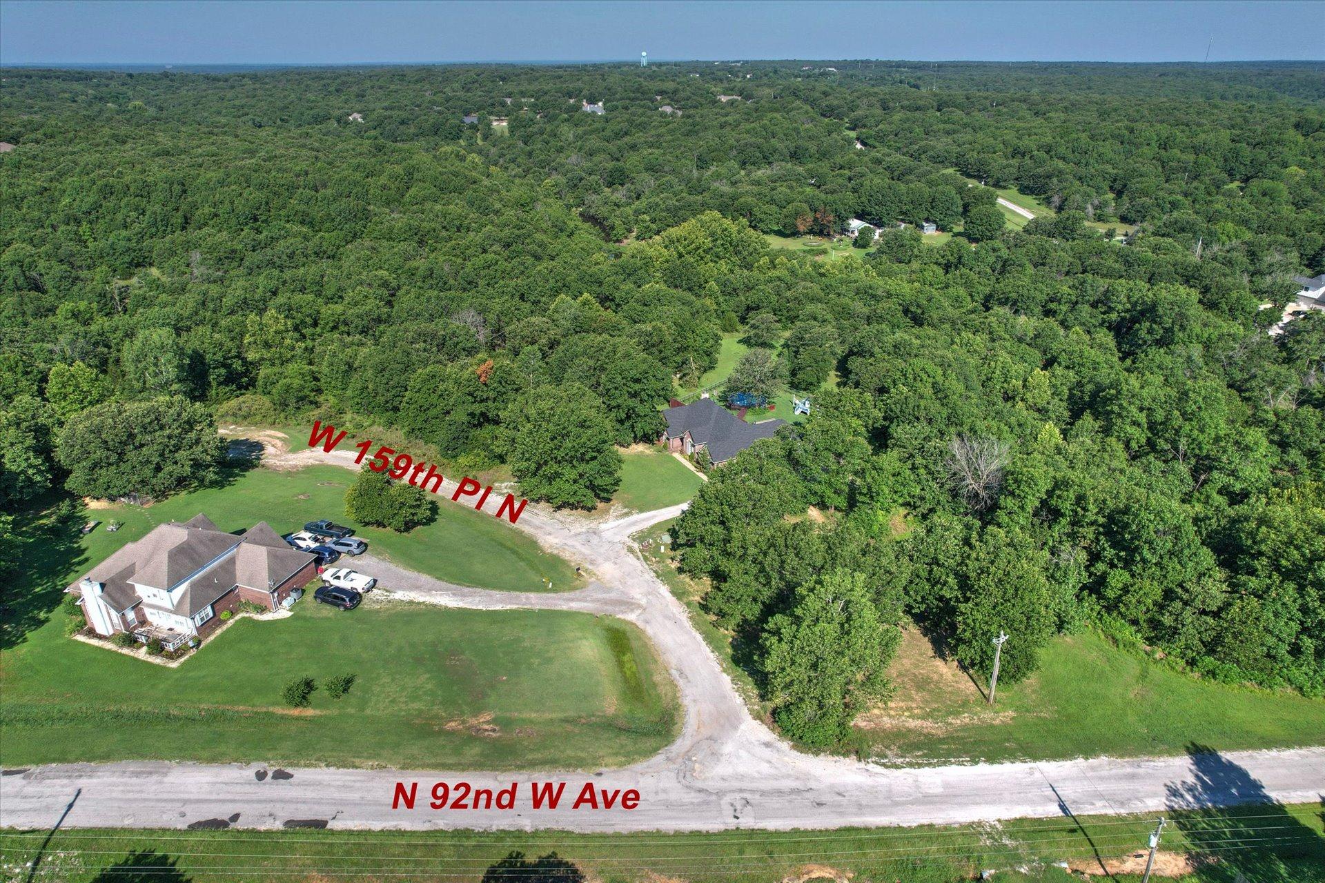 Image 2: Expansive wooded acreage featuring a cleared build