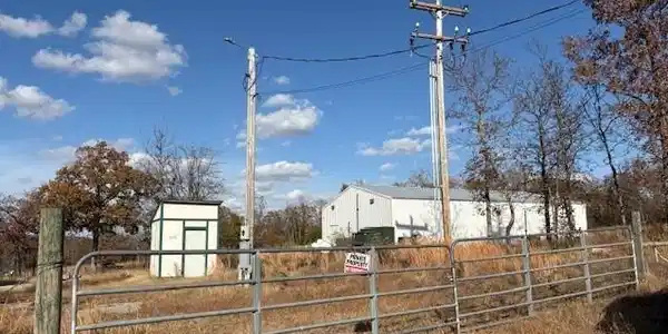 Image 2: front gate view of 2nd shop