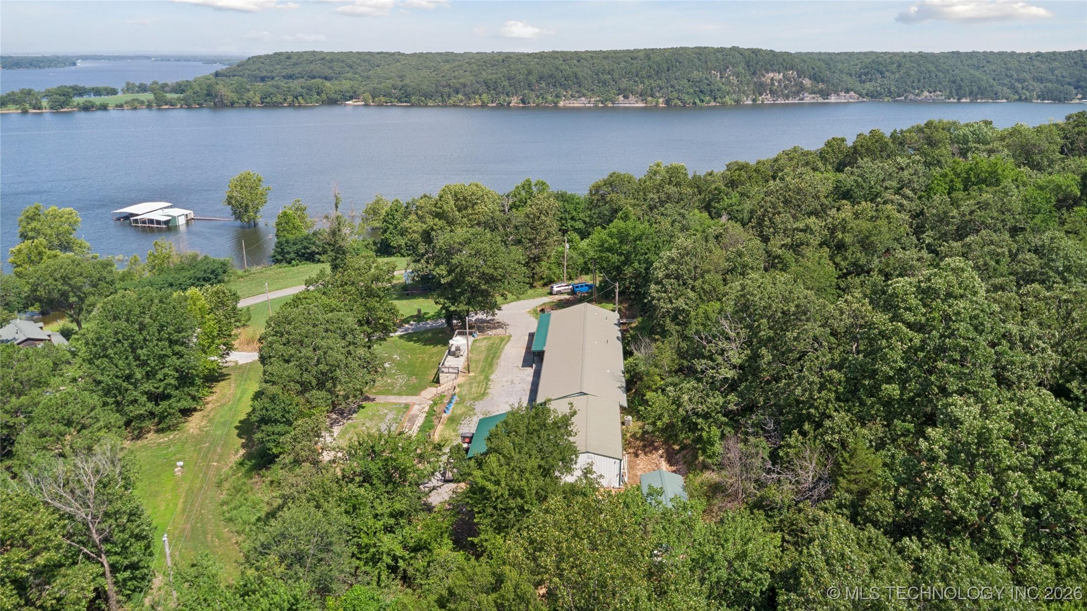 Image 1: Sweeping Lake Hudson Views! Nestled on 1.33 acres,