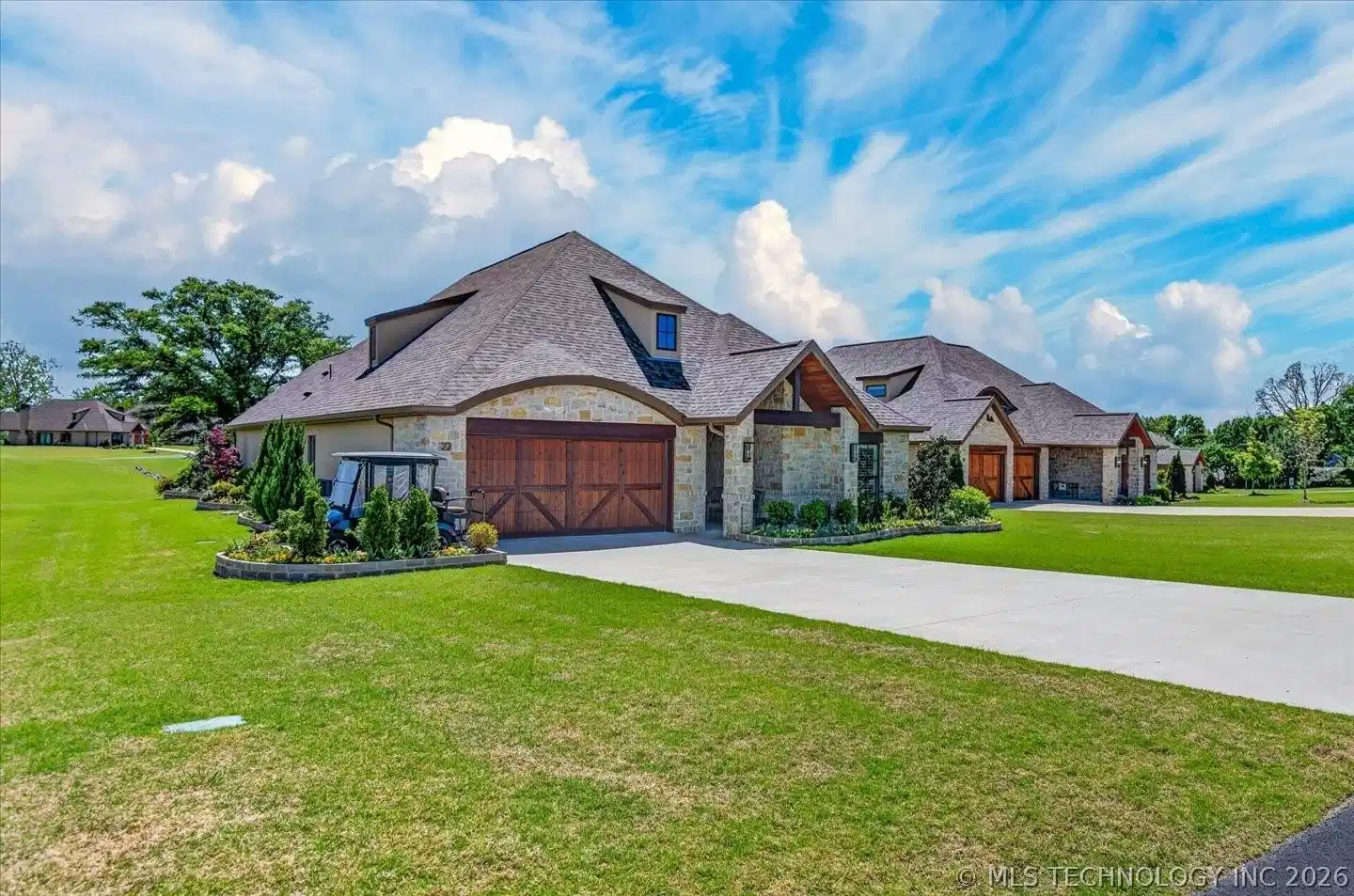 Image 1: This home is located in the Ridge at Shangri-La. I