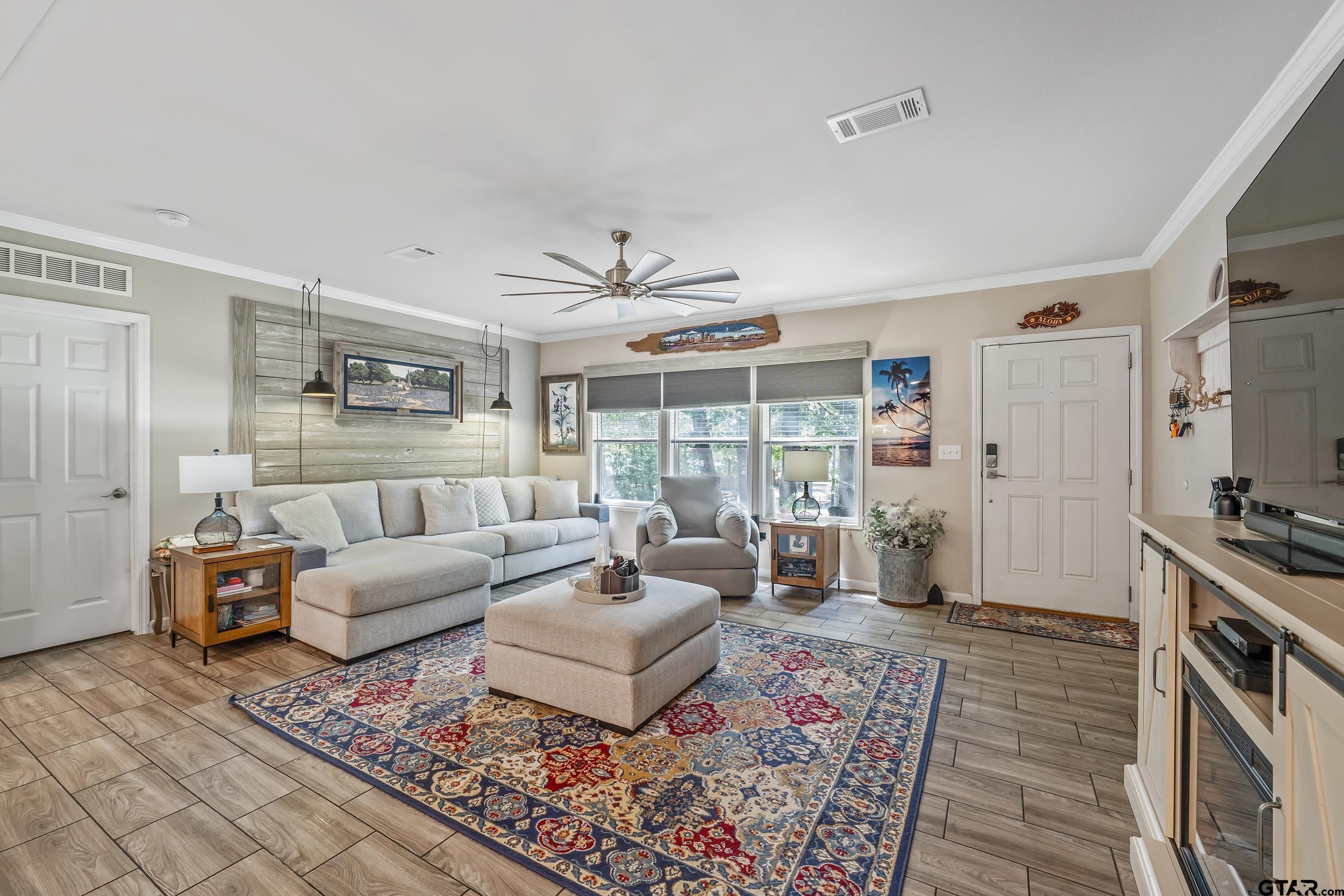 Image 3: Living Room with Shiplap Accent Wall