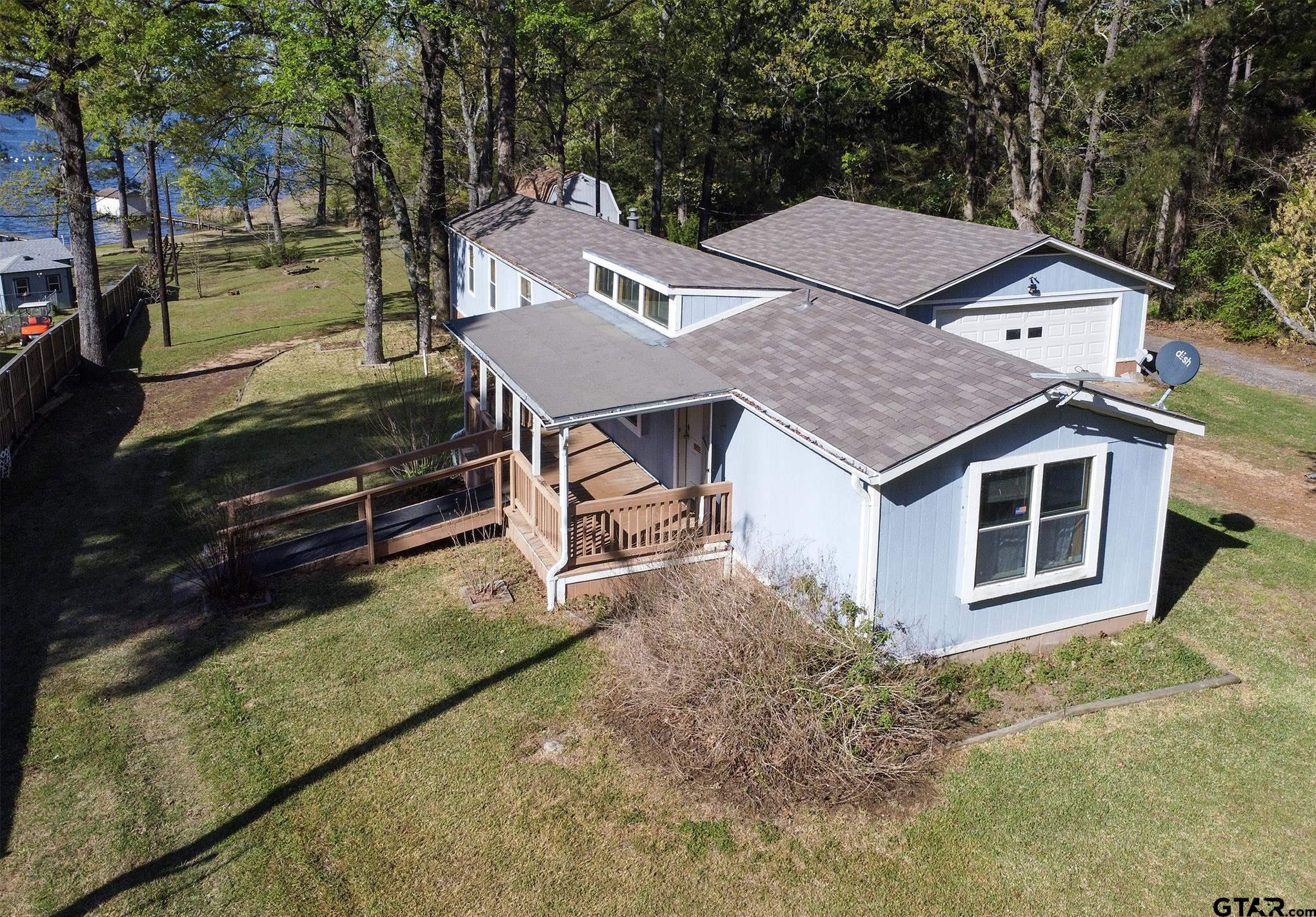 Image 0: Primary House & lake