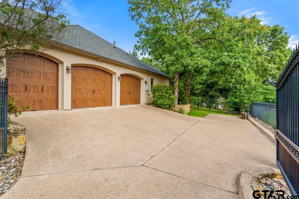 Image 3: Gated 3 Car Garage Area