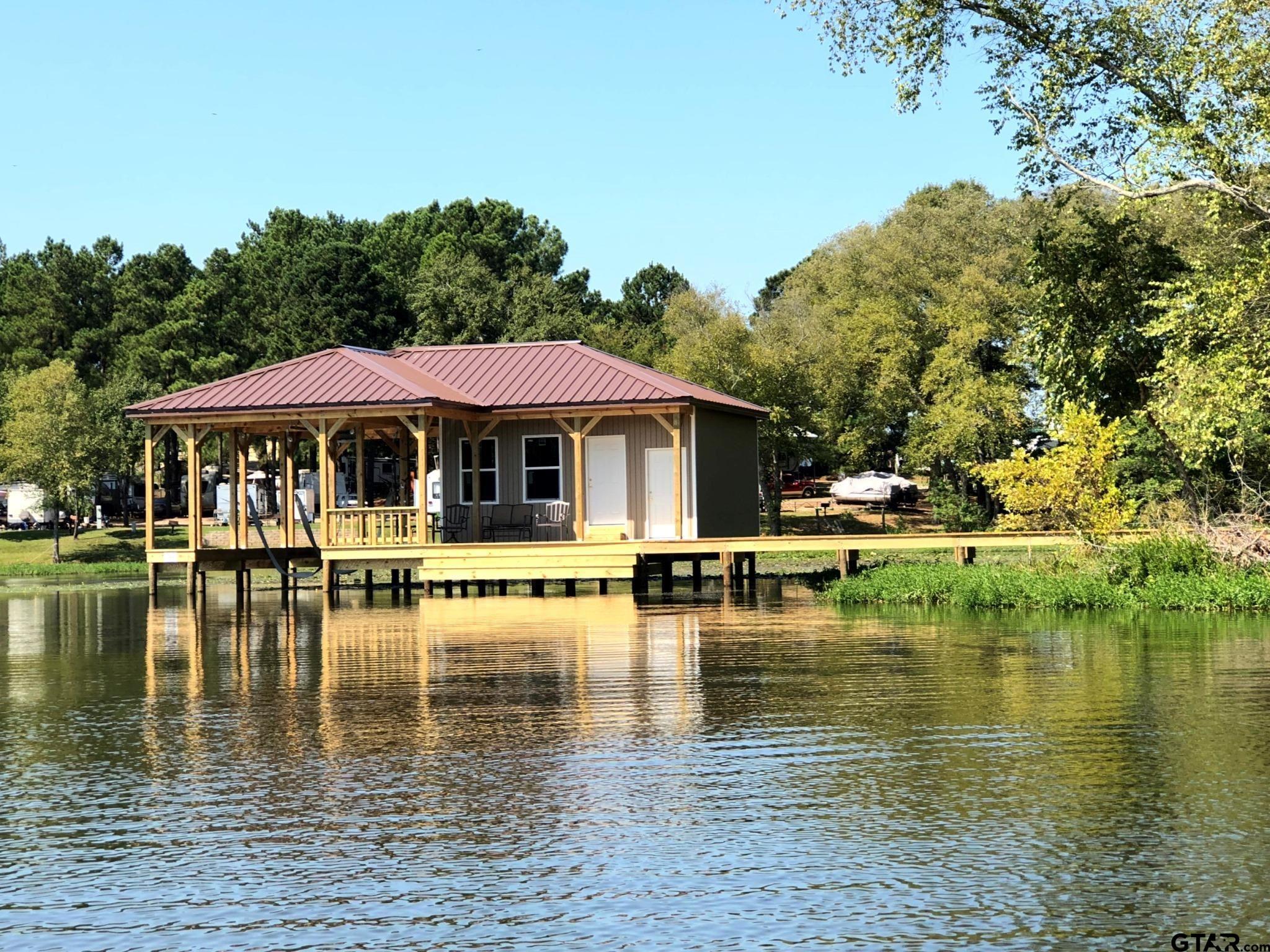 Image 2: Boathouse Acreage Waterfront Lot!