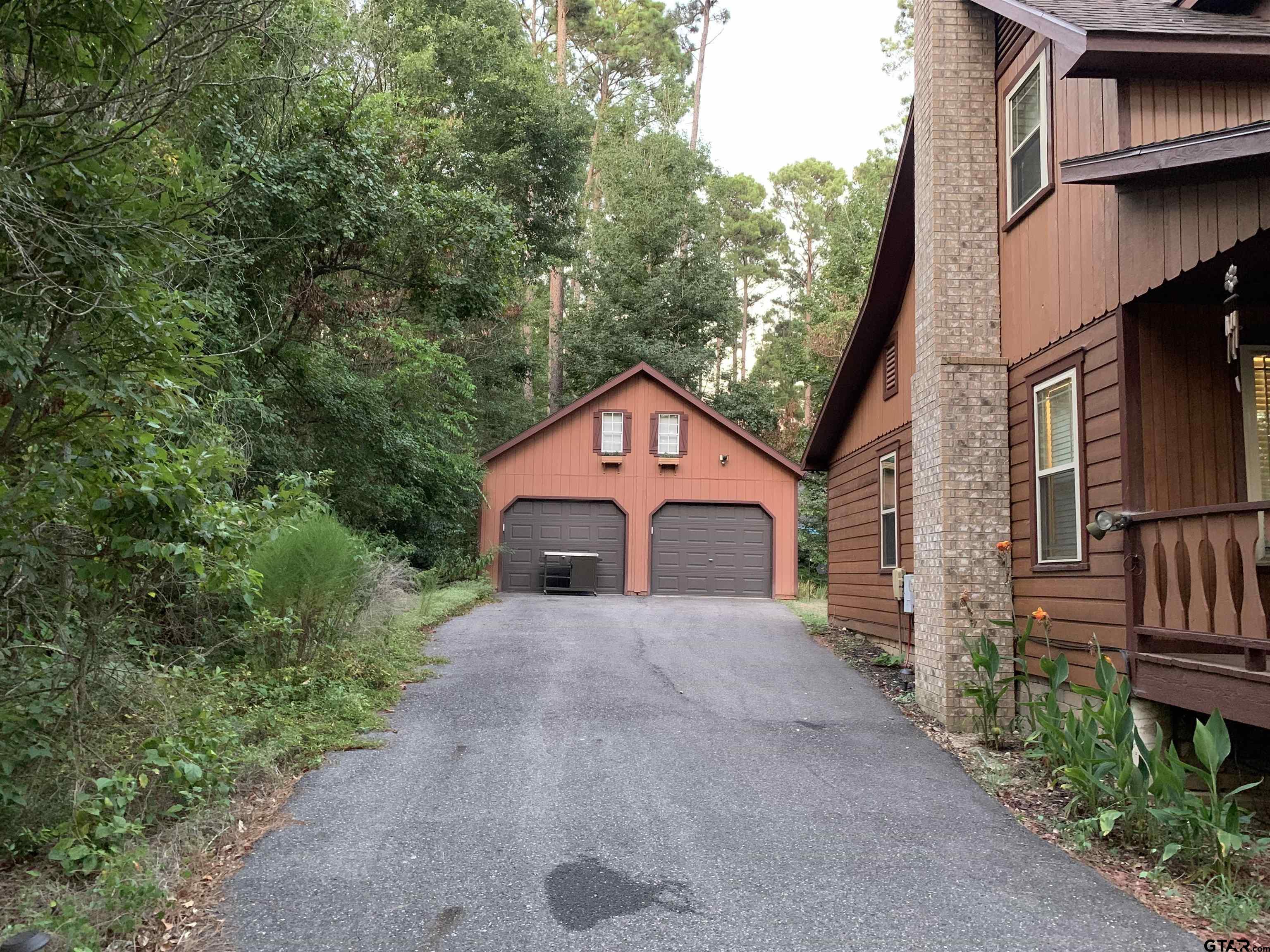 Image 4: Oversized detached garage with finished room above
