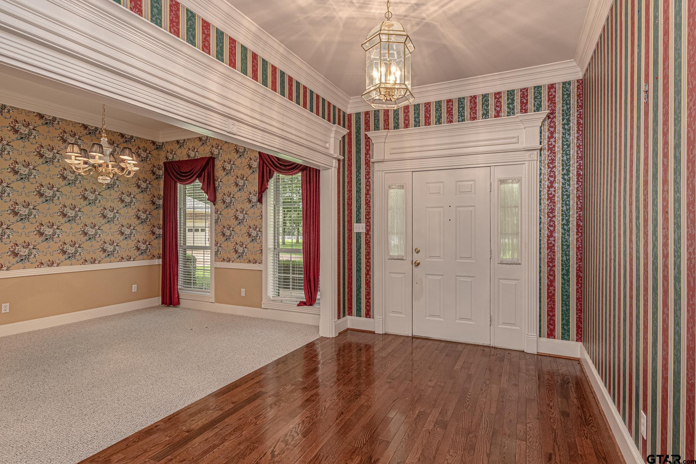 Image 3: Classic entry with wood floors, Entryway