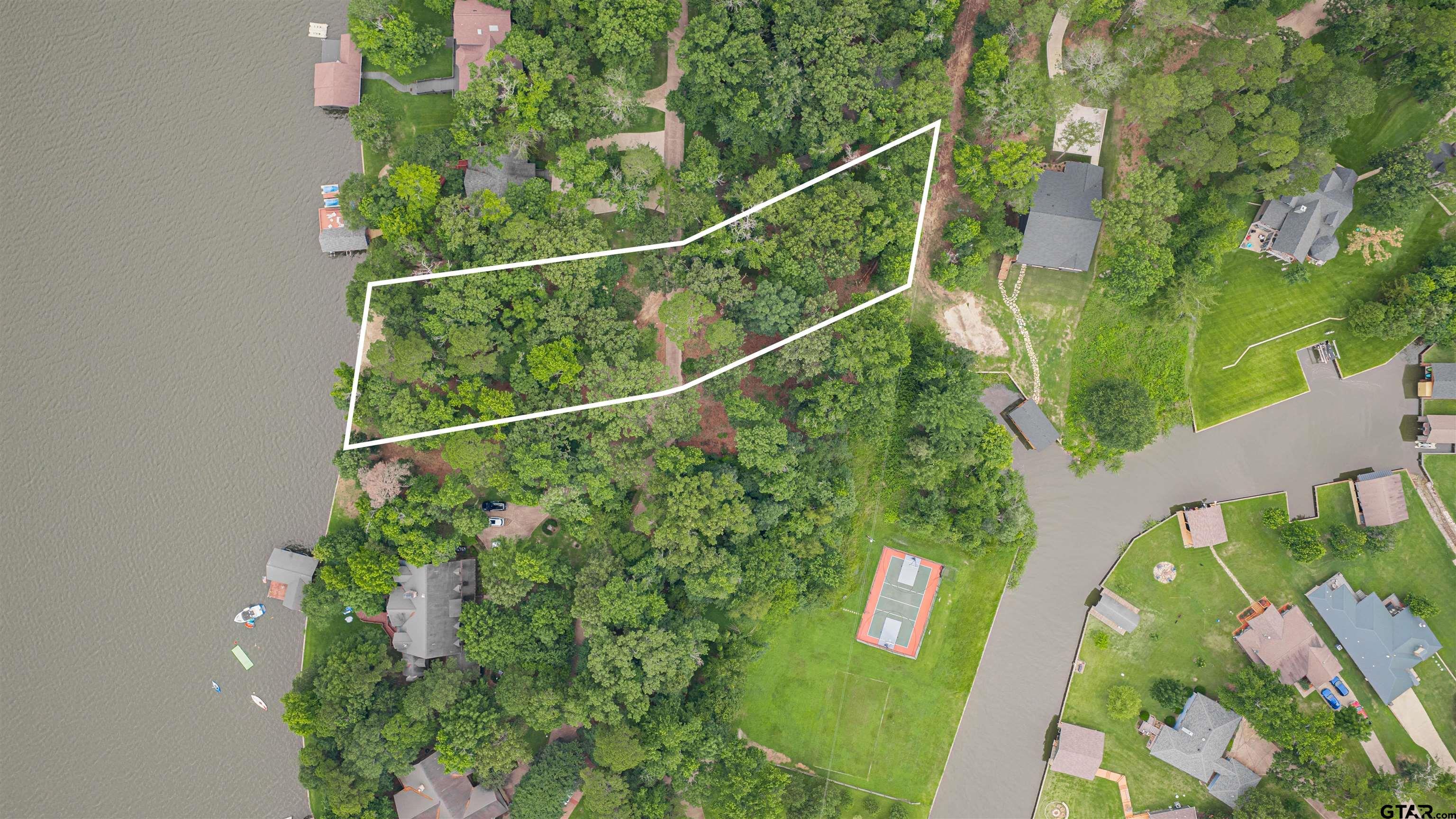 Image 0: Wooded 0.884-Ac. Lot