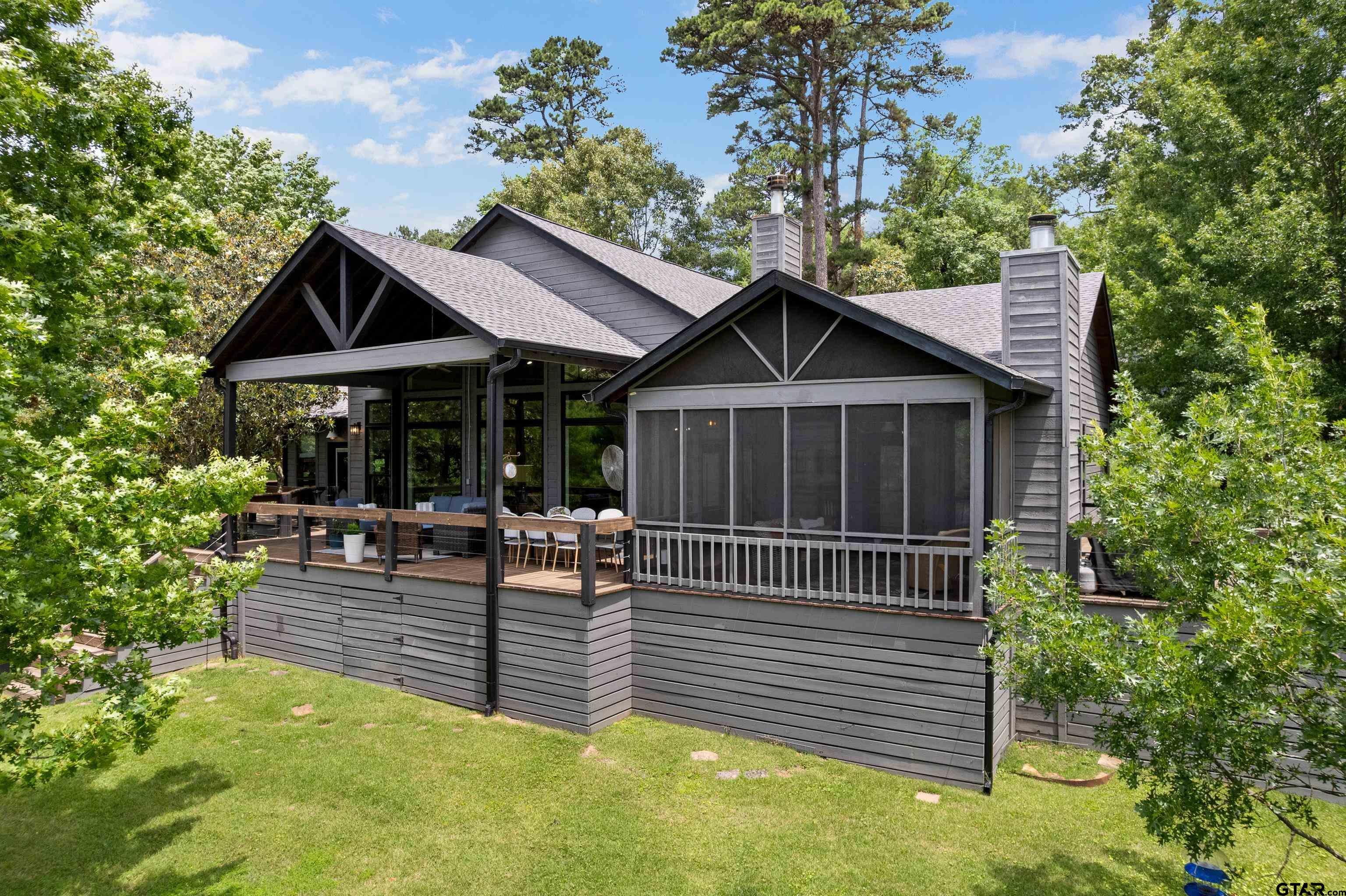 Image 0: Lake Side of House