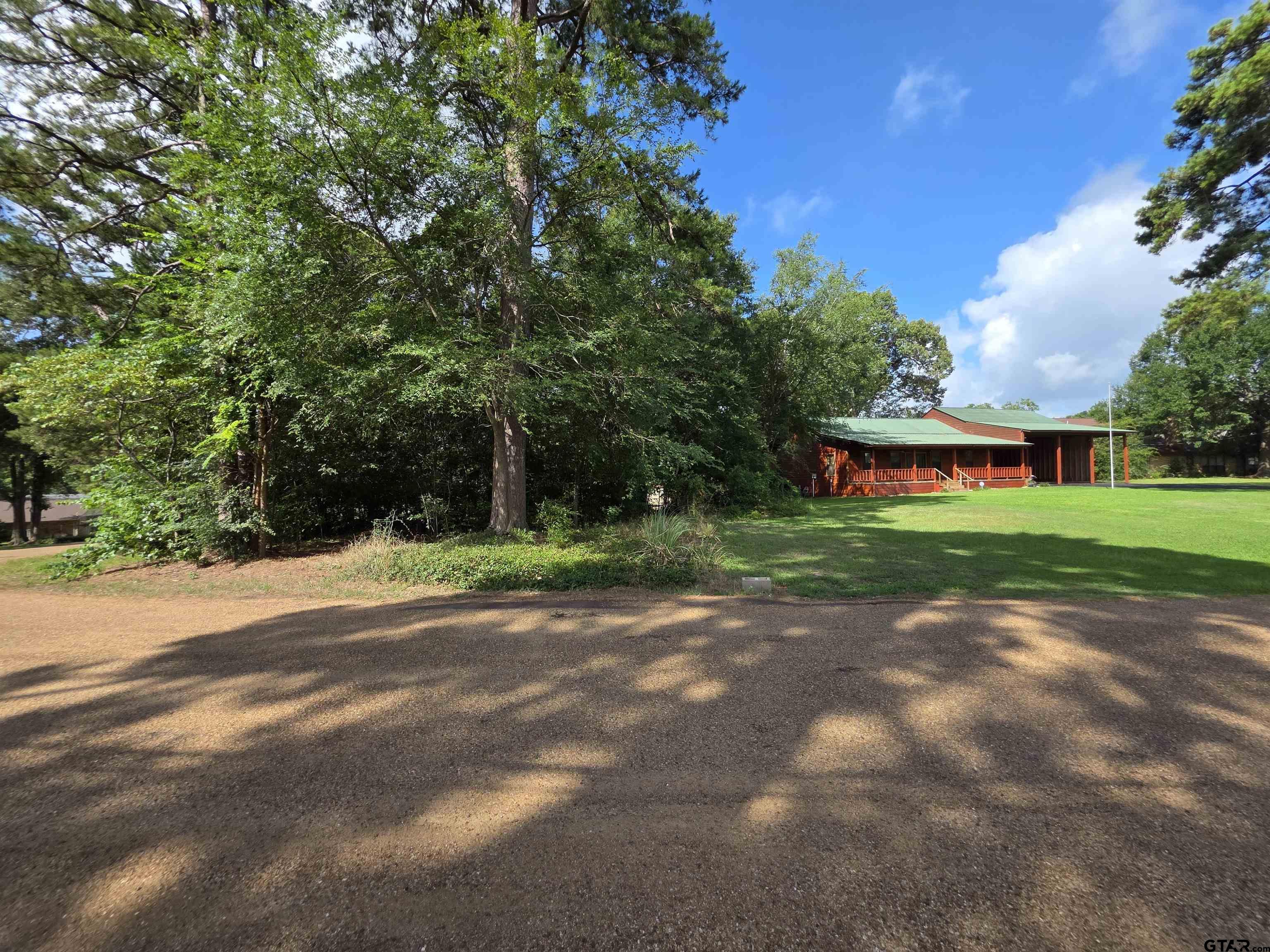 Image 3: Extra lot has trees
