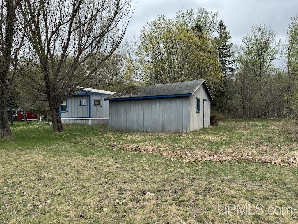 Image 1: Garage in good shape.  Trailer must be demolished., Garage and Trailer